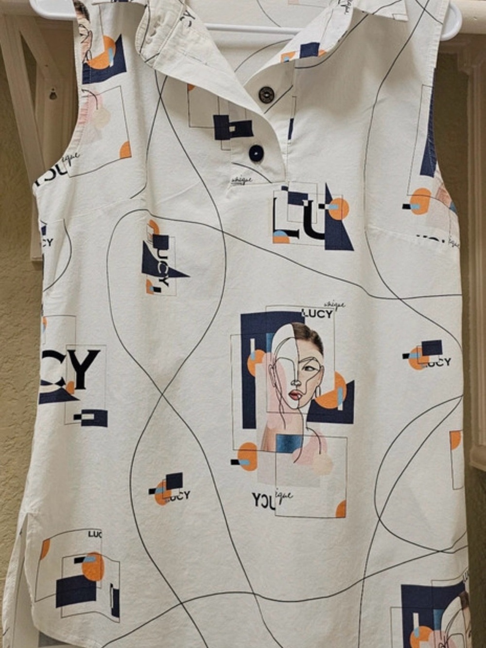 Lucy Cream Sleeveless Button-Front Top with Navy & Orange Abstract Print